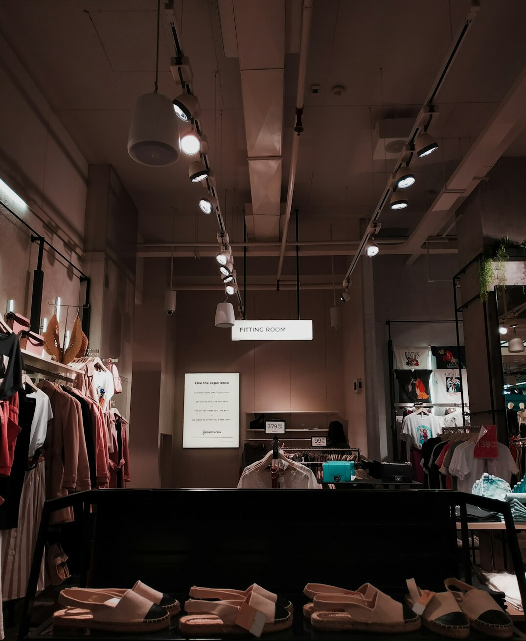 store detective watching shoppers