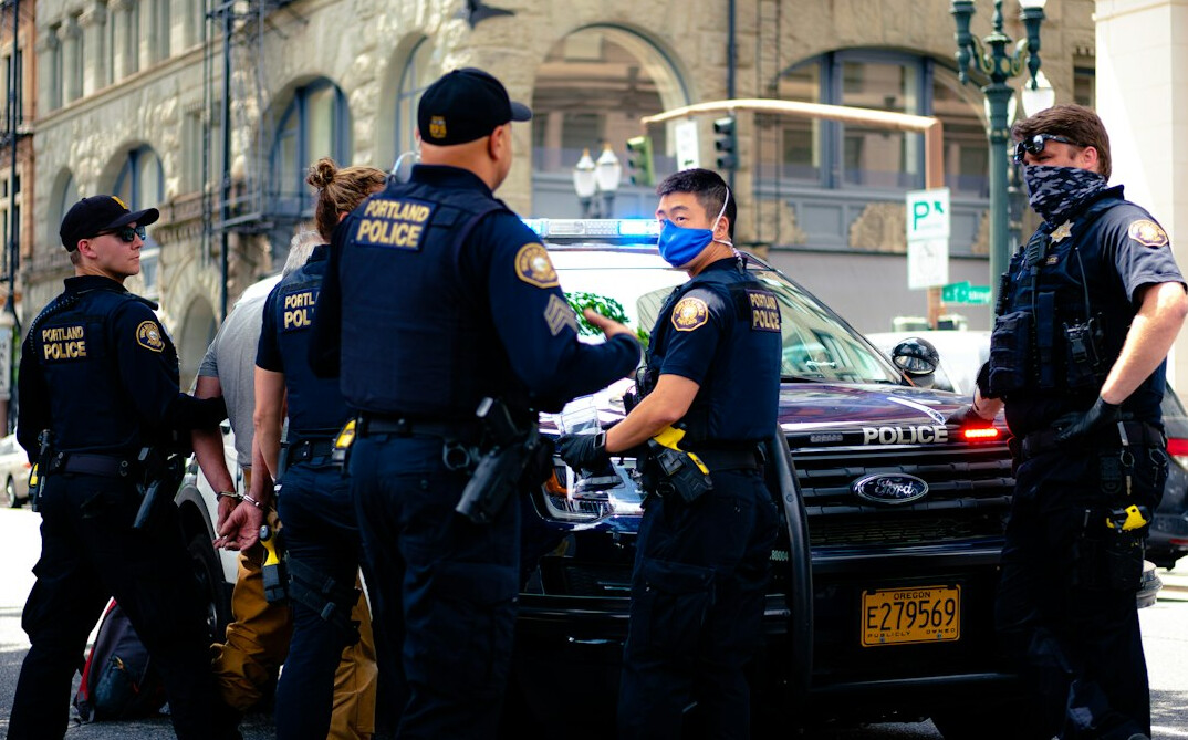 police arresting shoplifters